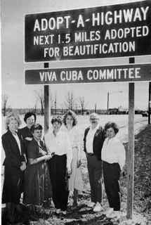 Viva Cuba Members pose with the first Adopt-A-Highway Sign