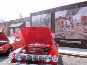 This flashy ride sits in front of one of Cuba' MO's Civil War murals.