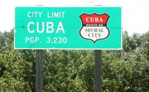 Cuba MO's city limit sign boasts of its Route 66 Mural City designation.