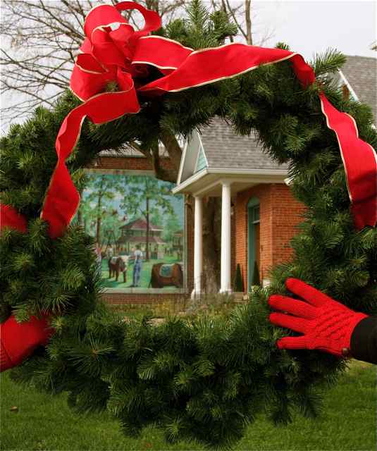 The wreaths are being hung in preparation for Viva Cuba's Yuletide Tour.