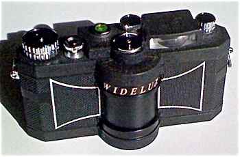 This vintage widelux camera with its unusual moving lens takes panoramic shots.