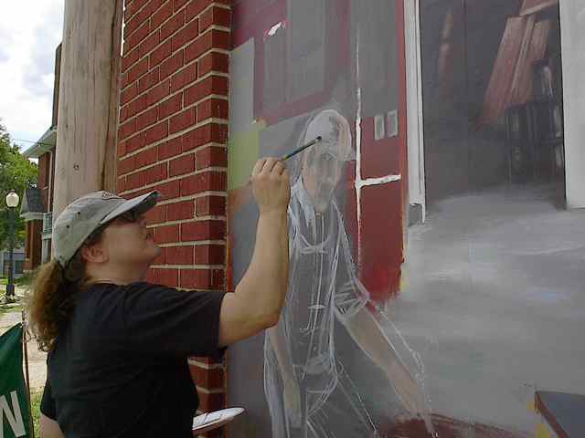 Julie Nixon Krovicka painted her father's image on the Millworks mural