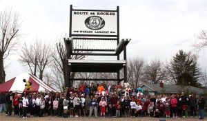 The group gathered under the rocker for the group shot.