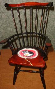 This doll chair would make a comfortable seat for an American Girl doll.