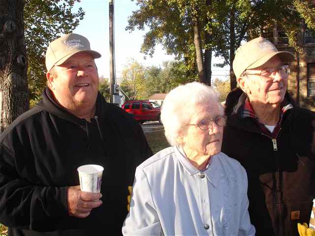 Phil, Mrs. Mullen, and W.D. watched the Veterans Memorial put in place.