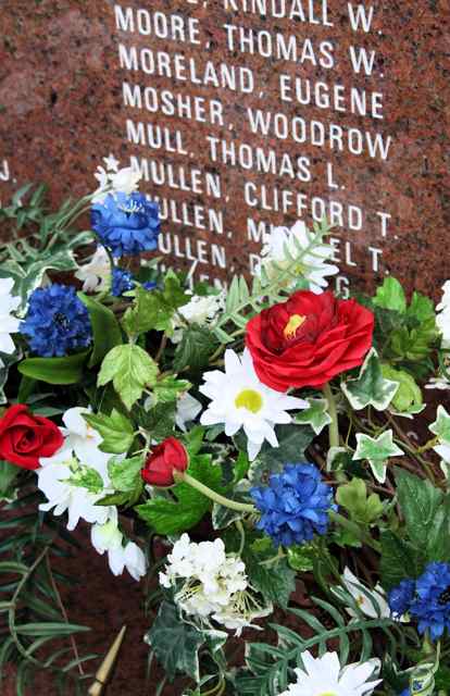 The name Clifford T. Mullen is listed above the wreath in this photo.