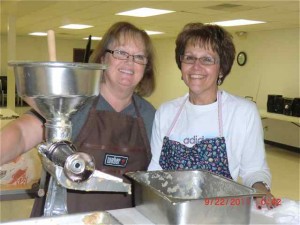 Jan and Marcia making apple butter