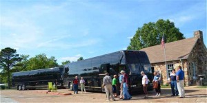 Buses from Legends Bank at Connie's Shoppe at the Wagon Wheel Motel