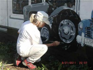 Leslie Faust repairs a tire in Cuba, Missouri