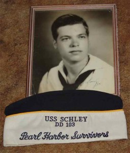 A photo of a young Joe White and his Pearl Harbor Survivor Cap