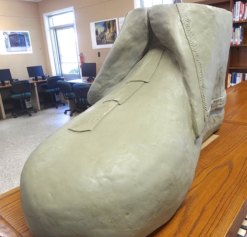 This large moccasin on display gives an idea of the enormous size of the project. 