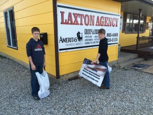 Alex and Nick Laxton pick up around their dad's Hwy. 19 insurance agency.